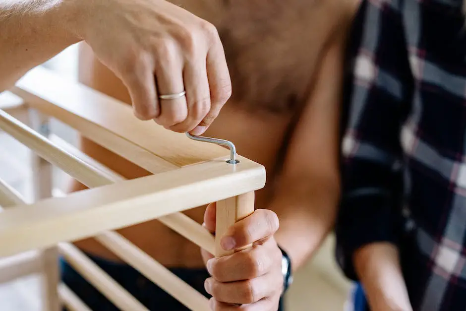 A person assembling an IKEA furniture piece with focus and determination