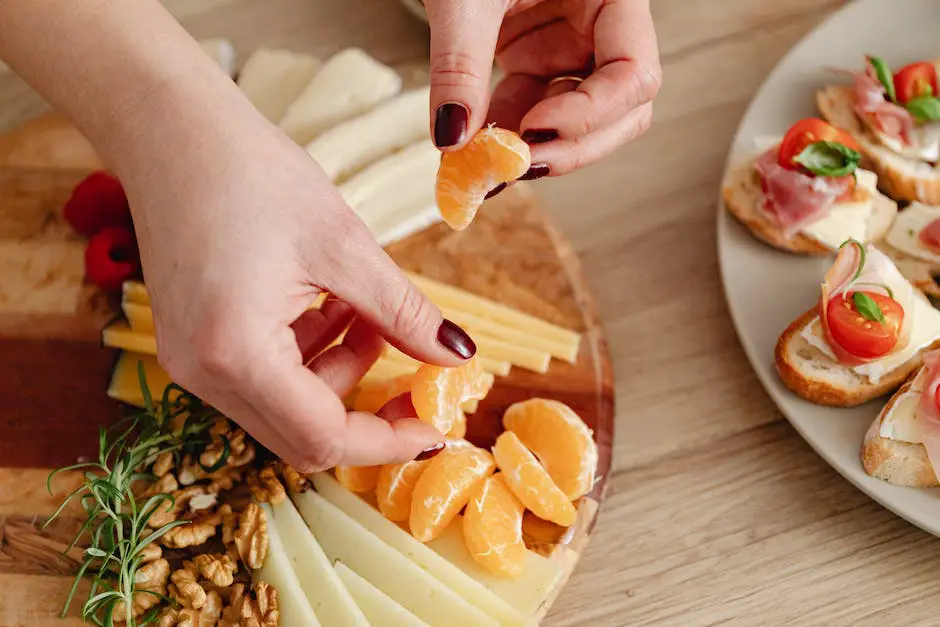 Various types of cheeses and accompaniments on a wooden cheese board