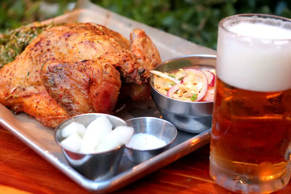 A picture of a deliciously cooked rotisserie chicken with a golden and crispy skin, served with vegetables on the side.