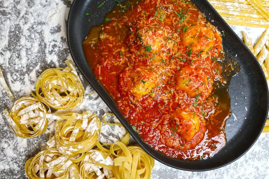 A picture of a dish with gluten-free pasta and meatballs on it.