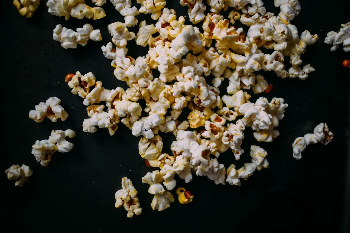 Image illustrating Costco's popcorn variety, showing different popcorn flavors and packaging options